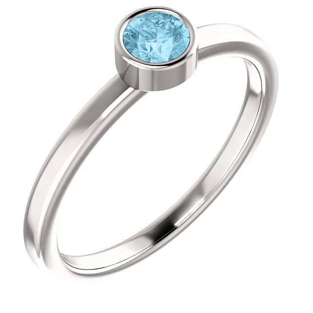 14KT GOLD 0.23 CT ROUND AQUAMARINE BEZEL-SET RING