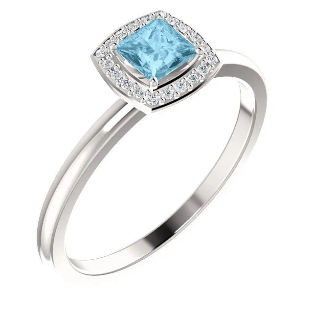 14KT GOLD 1/4 CT AQUAMARINE & 1/20 CTW DIAMOND HALO RING