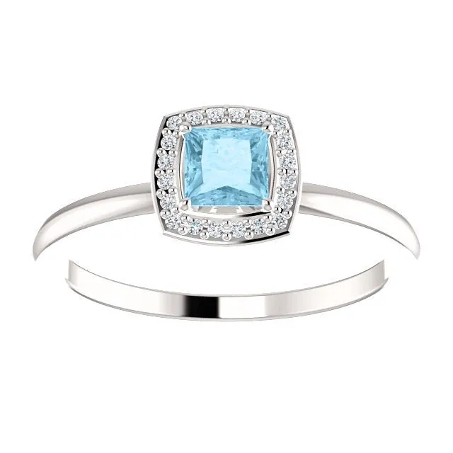 14KT GOLD 1/4 CT AQUAMARINE & 1/20 CTW DIAMOND HALO RING