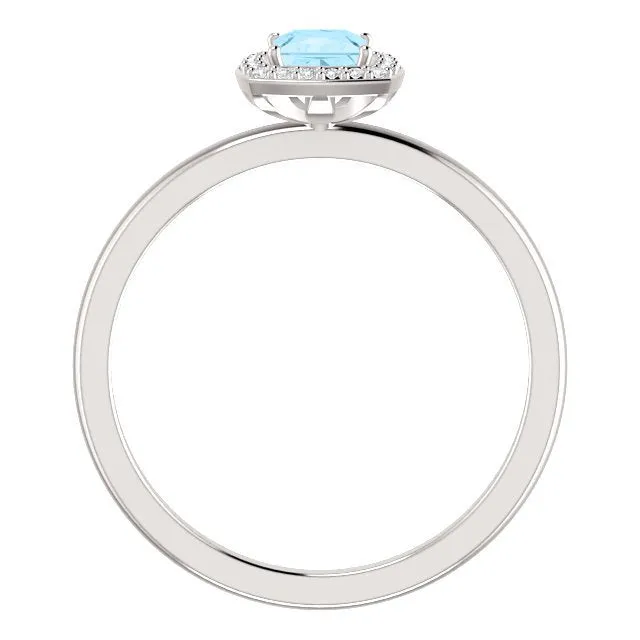 14KT GOLD 1/4 CT AQUAMARINE & 1/20 CTW DIAMOND HALO RING