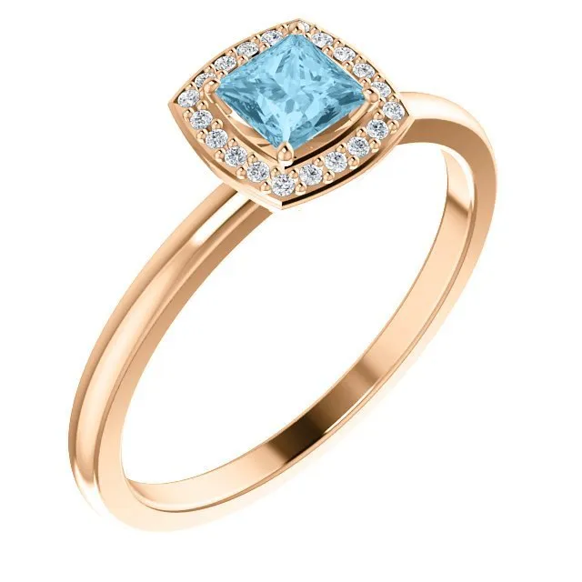 14KT GOLD 1/4 CT AQUAMARINE & 1/20 CTW DIAMOND HALO RING