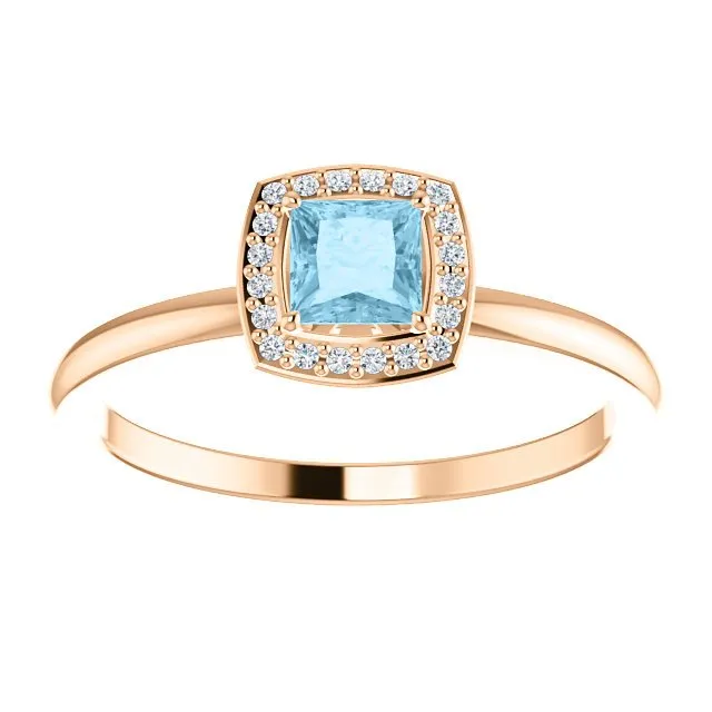 14KT GOLD 1/4 CT AQUAMARINE & 1/20 CTW DIAMOND HALO RING