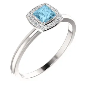 14KT GOLD 1/4 CT AQUAMARINE & 1/20 CTW DIAMOND HALO RING