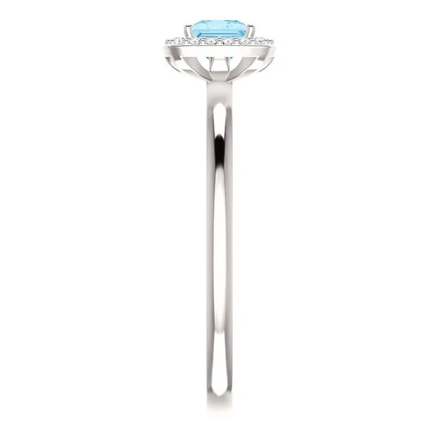 14KT GOLD 1/4 CT AQUAMARINE & 1/20 CTW DIAMOND HALO RING