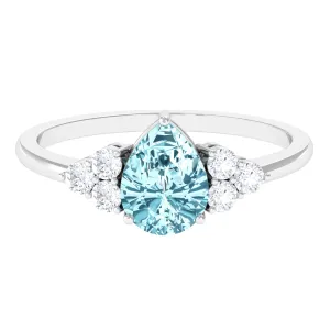 Classic Pear Shape Aquamarine Solitaire Ring with Diamond Trio