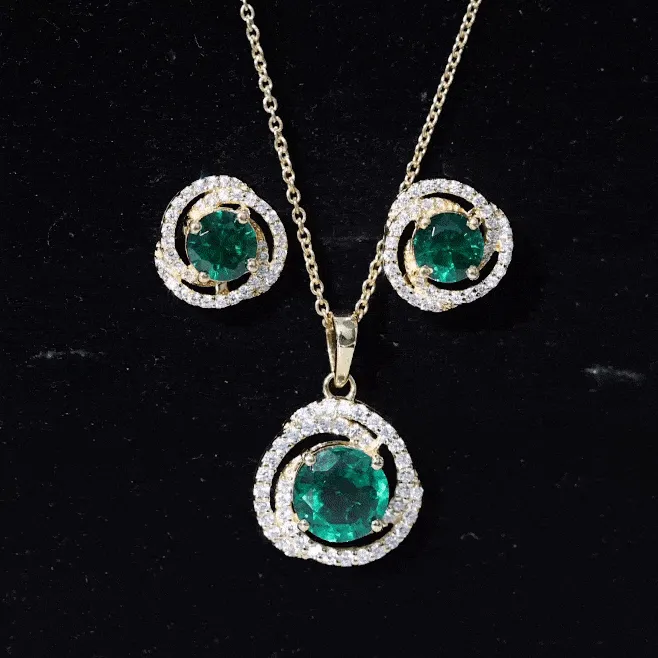Created Emerald Swirl Pendant And Earrings Set With Moissanite
