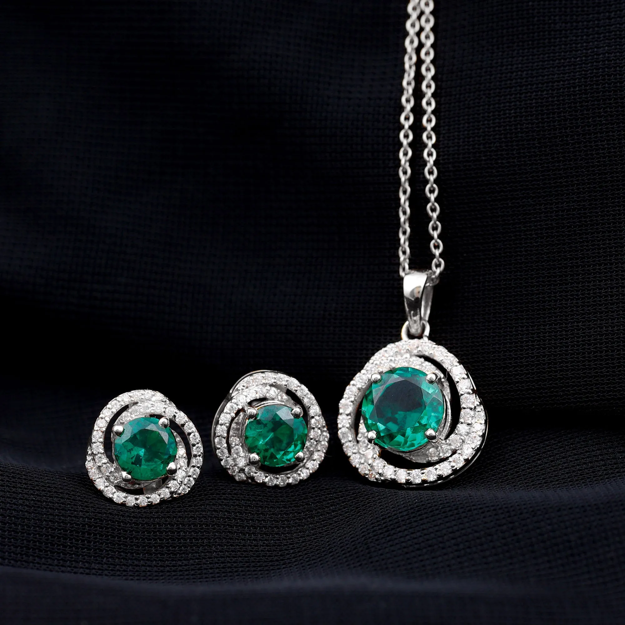 Created Emerald Swirl Pendant And Earrings Set With Moissanite