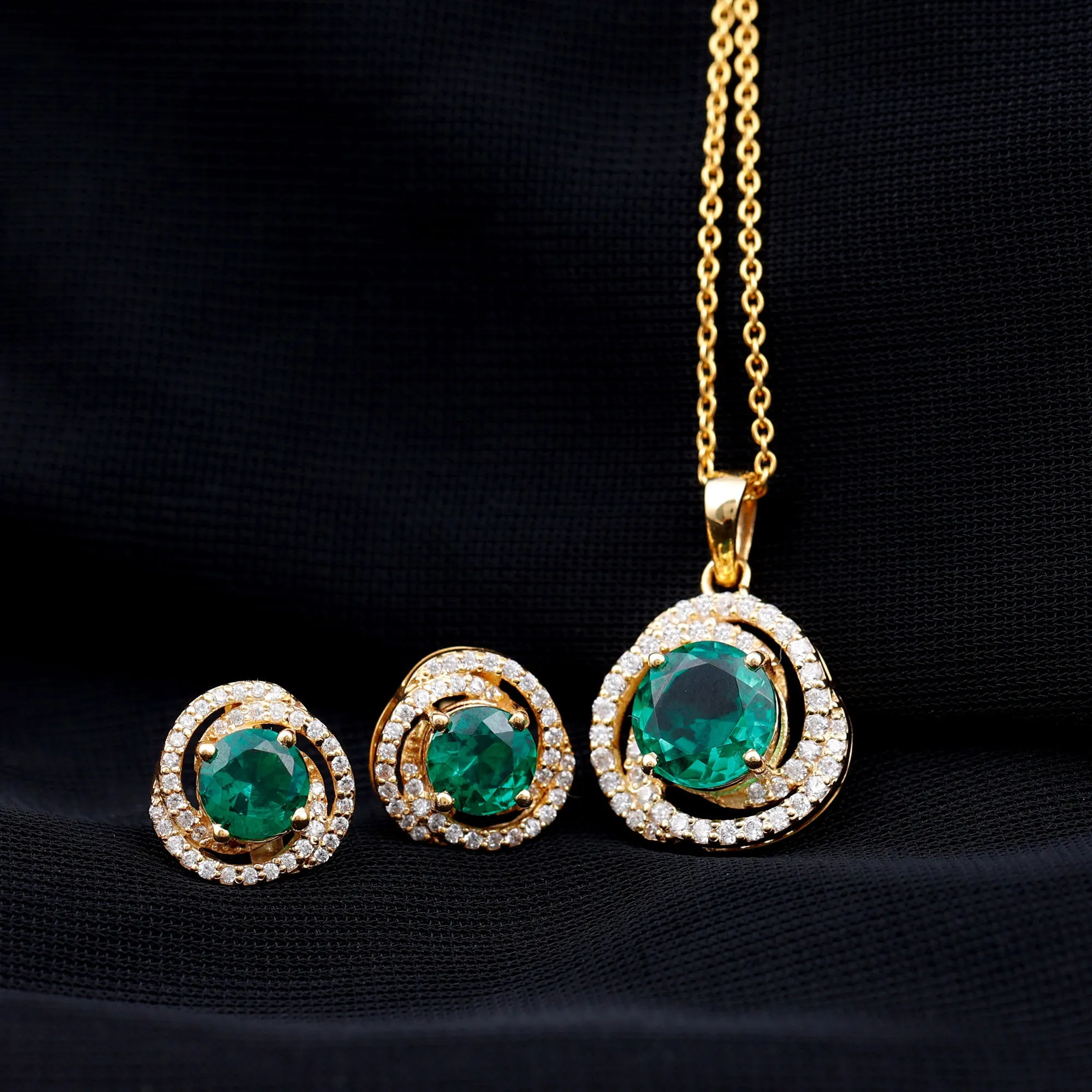Created Emerald Swirl Pendant And Earrings Set With Moissanite