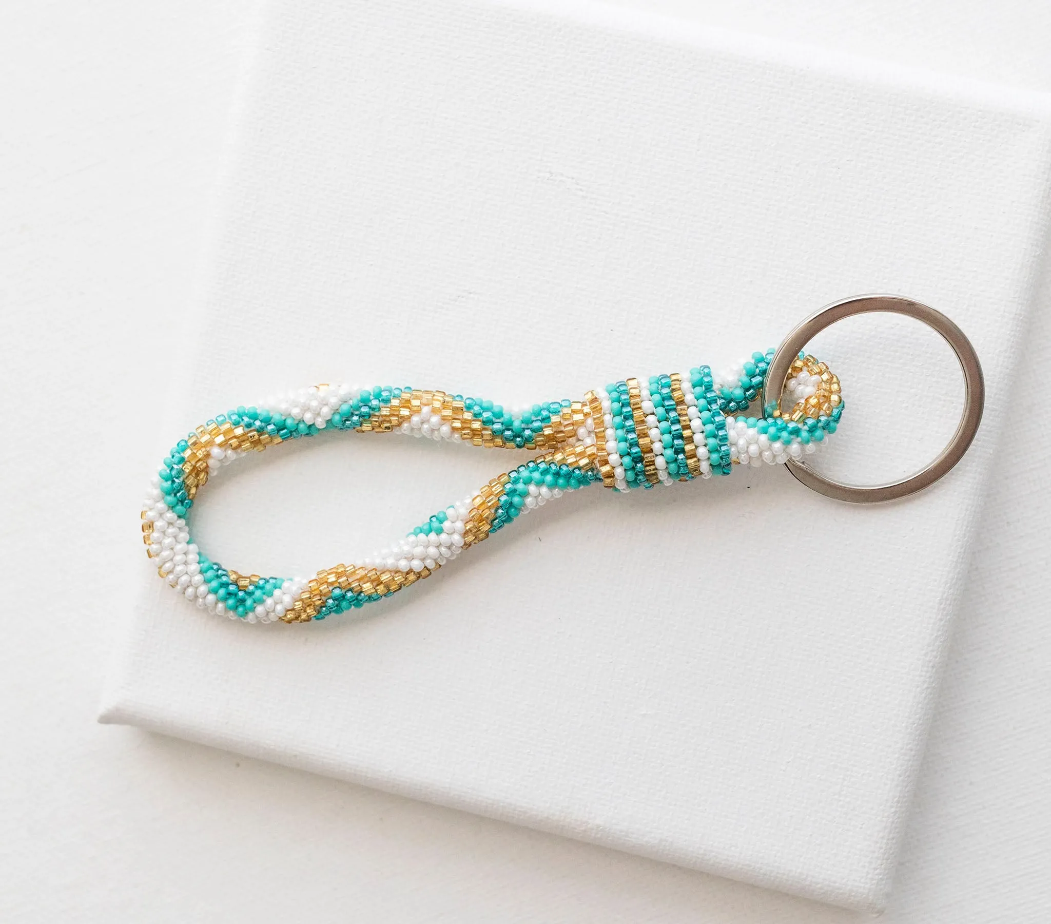 The Original Roll-On® Keychain <br> Aquamarine